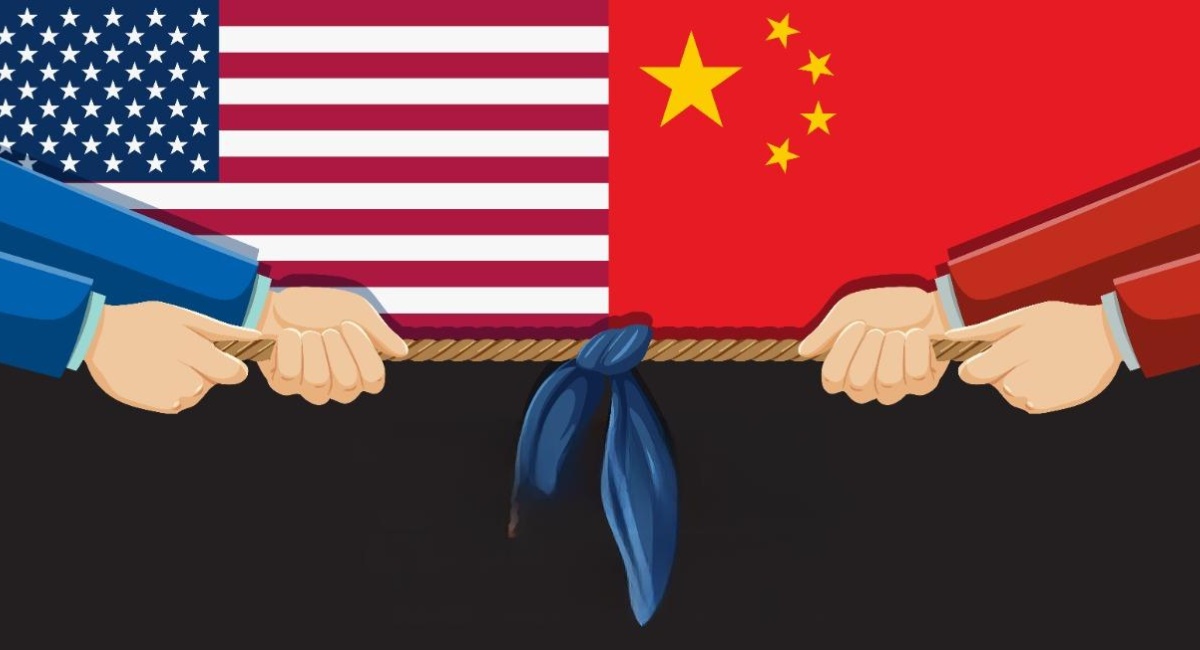 Tug of war between the American flag and the Chinese flag symbolizing the US-China trade war